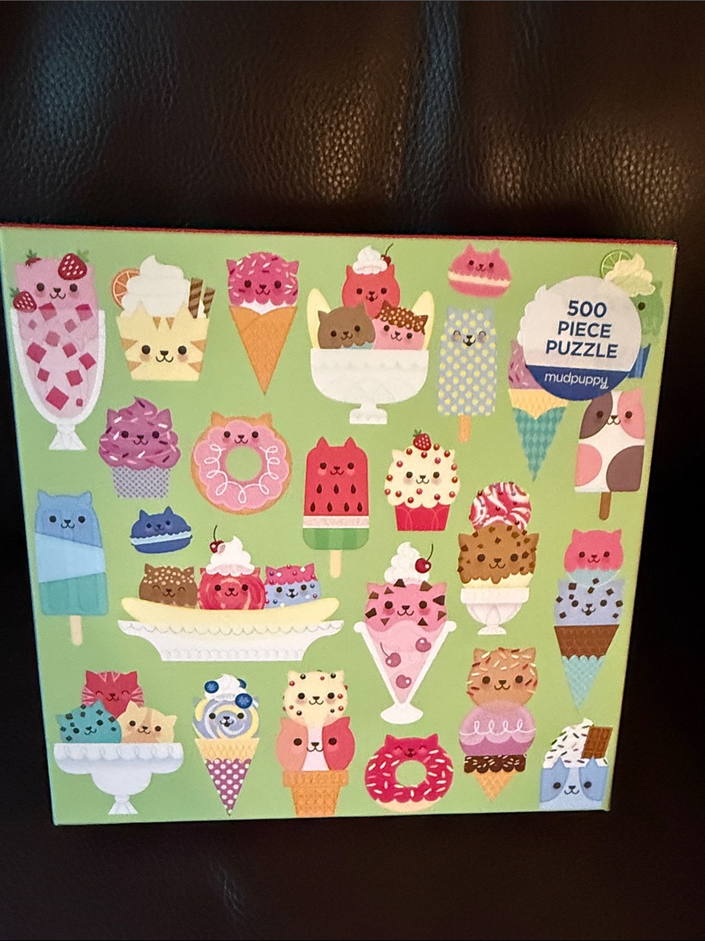 Cat Cafe Puzzle 500 piece by Mudpuppy.